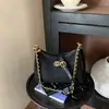 Bolso de mano de moda para mujer 2026 nuevo bolso de hombro con cadena francesa y patrón de diamantes, bolso de axila, bolso tote y bandolera de alta gama, moderno