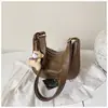 Bolso Cruzado Informal Tipo Dumpling 2026 Nuevo Estilo Moda Simple Alta Apariencia Color Sólido Tendencia Nicho Viaje Diario Bolso de Hombro Único