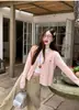Cárdigan de punto para mujer con hilo de torsión de tres cabos, estilo nuevo de principios de primavera 2026, chaqueta suéter suave y acogedora de punto de ochos con diseño de corazón