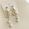 Pendientes de botón de flores estilo festivo francés Super Fairy Pendientes de borlas de cuentas hechos a mano Pendientes delgados de cara elegante Sentido avanzado