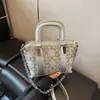 Bolso de mano nicho simple y versátil estilo coreano para mujer, nuevo bolso de hombro y cruzado de moda casual 2026