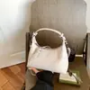Moda estilo coreano versátil nicho de alta gama bolso tejido 2026 nuevo vintage bandolera cruzada