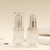 Botella prismática de acrílico de 10 ml para loción botella de color para tatuajes gotero botella de aceite esencial crema para ojos esencia de aceite esencial venta al por mayor