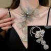 Moda Europea y Americana Elegantes Aretes de Borla de Flor Hueca de Metal Lujo Ligero Elegantes de Clase Alta Elegantes Aretes de Estilo Frío