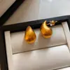 Populares Pendientes de Geometría Nueva Retro Europeos y Americanos, Esmerilados con Forma de Gota de Agua, Pendientes de Botón Dorados Sencillos y de Alta Gama con Forma de Luna para Mujer