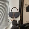 Bolso de mano pequeño elegante de alta gama para mujer, nuevo bolso cruzado de moda versátil 2026, bolso de hombro tipo silla de montar sensación popular de internet