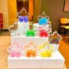 Nuevas cuentas de burbujas luminosas de aceite acrílico botella de arena movediza de flor de cerezo adornos de flores creativos colgante de bolsa al por mayor