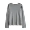 Suéter de punto liso para mujer de primavera y otoño con cuello redondo y bordes enrollados, suéter de punto fino ajustado, top de capa base