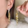 "La hija del chaebol" aretes largos de borla de trigo dorado exquisito temperamento de lujo ligero de alto valor aretes de industria pesada para mujer