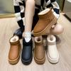 Botas de nieve de alto valor de color para mujer 2023 invierno nuevas de caña corta de algodón con forro polar engrosadas impermeables antideslizantes de cuero zapatos de algodón