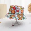 Comercio exterior sombrero de pescador para niños verano nuevo sombrero para el sol estampado de dibujos animados pequeño sombrero de dinosaurio sombrero de sol para bebé YT01