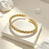 Pulsera abierta de alambre trenzado de acero inoxidable europea y americana transfronteriza para hombre, simple, callejera, hip-hop, versátil, al por mayor para mujer