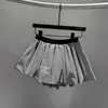 Saia Curta Meia-Calça Xadrez Florido de Verão Feminina Petite Moda Casual Cintura Alta Evasê Menina Quente Antiexposição Fofa