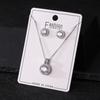 Pendientes redondos de circonita con incrustaciones de cobre caliente transfronterizo, colgante de bolso redondo, collar, traje de moda, joyería ligera de lujo para mujer