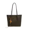Bolso de gamuza para mujer, nuevo modelo de otoño 2026, bolso de hombro vintage de alta gama Maillard, bolsa de mano de gran capacidad