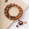 Dunhuang Bodhi Manzana Perla DIY Lingzhi Candado Estilo Pulsera Especificaciones 7x9 Hombres y Mujeres Juego Cultural Cuentas de Oración Fabricante Venta al por Mayor