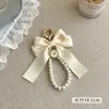 Chaveiro Pingente Cruzado Novo Estilo Retrô Europeu e Americano Grande Laço de Pérola Artificial Pingente de Pérolas Artesanais Ornamento