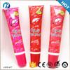 Cosméticos impresos de fábrica bálsamo antigrasa ungüento manguera de aluminio y plástico con bisel de masaje manual cabeza de lápiz labial 15ml