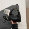 Bolsa de Mão Coreana de Nicho Bolsa Bolinho para Mulheres 2026 Nova Moda Cor Sólida Versátil Bolsa de Ombro Transversal