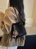 Este año, los bolsos tipo cubo de estampado de leopardo de moda son tendencia en el mercado de exportación.. Aquí está la nueva colección 2026: un bolso de hombro y bandolera retro y versátil para mujer