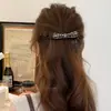 Pinza de plátano con lazo de estampado de leopardo estilo coreano para mujer, nuevo modelo 2026, de alta gama y elegante, adecuado para cabello grueso, clip vertical para coleta alta