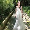 Traje de falda blanca de estilo suave y súper hada francesa para mujer, primavera y verano, top retro de encaje con tirantes, falda midi, conjunto de dos piezas