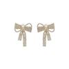 Aretes de lazo grande aretes grandes exagerados Red de celebridades aretes de joyería para la oreja de diamantes completos diseño de personalidad aretes de industria pesada al por mayor