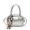 Bolso de mano estilo bolos de estilo coreano, moderno y de nicho, para mujer, nuevo estilo 2025, sencillo, popular, informal, combinable con todo.