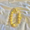 Lanyard para teléfono móvil cuerda corta para muñeca cadena de cuentas hecha a mano colgante portátil ins japonés y coreano mariposa colorida teléfono móvil