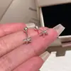 Pendientes de estrella de mar simples y versátiles para mujer, con un diseño único y un toque de elegancia, adecuados para orejas recién perforadas, perfectos para un estilo de vacaciones en la playa, disponibles al por mayor