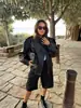 Chaqueta corta de cuero PU de estilo europeo y americano con cuello alto, talla grande, para mujer, estilo callejero casual holgado, versátil estilo motero