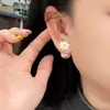 Pendientes Pequeños de Flor de Margarita con Pasador de Plata, Pendientes Frescos y Elegantes con un Toque Refinado de Nicho de Alta Gama, Nuevos Accesorios de Oreja de Flor 2026