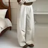 Pantalones casuales holgados de diseño plisado estilo japonés, con corte curvo, para mujer, nuevo modelo de otoño 2026, versátiles de color liso, pierna ligeramente ancha, venta al por mayor
