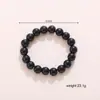 Europa y Estados Unidos pulsera de cristal de imitación transfronteriza pulsera de té de jade blanco de imitación negra color brillante clásico Joker joyería de color sólido al por mayor
