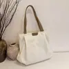 Bolsa Tote de Ombro Feminina Nova e Elegante para 2026 Bolsa de Mão Casual Simples Bolsa de Tecido Oxford de Alto Valor