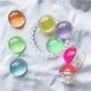 Suporte de Airbag em epóxi transparente cor sólida bola de cristal suporte retrátil de mesa para celular atacado