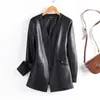 Chaqueta de cuero negra de longitud media para mujer Haining con cuello alto y cinturón, nuevo estilo otoño e invierno, elegante abrigo de piel de oveja