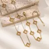 Conjunto de Collar y Pulsera de Acero Inoxidable Hueco de Cuatro Hojas de Nuevo Estilo Transfronterizo para Mujer, Conjunto de Cuatro Hojas de Moda y Versátil al por Mayor