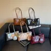 2026 Nuevo Bolso de Axila para Mujer Otoño Nicho Lujo Ligero Sensación de Alta Gama Bolso de Hombro Único Retro Versátil Bolso de Mano para Viaje