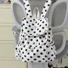 Mochila de lunares a la moda y con estilo estilo coreano para mujer con diseño de cordón, adecuada para viajes y uso al aire libre, moderna y ligera