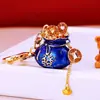 Llavero de coche tipo bolsa de la fortuna china para mujer, colgante de bolsa lindo y creativo, regalo de llavero de metal