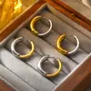 Brincos elegantes com costura circular retrô transfronteiriça em estilo coreano, banhados a aço titânio, anel de ouro verdadeiro 18k, brincos de nicho distintos para mulheres