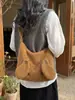 Bolsa de Ombro de Pelúcia Fofa Nova da Primavera 2026 para o Trabalho Bolsa Tote de Grande Capacidade Bolsa Transversal Doce de Nicho