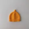 Gorro de lana cálido para bebé estilo coreano ins color liso otoño e invierno para niños y niñas simple versátil gorro para el frío