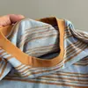 Camiseta de manga larga azul a rayas estilo perezoso, nueva colección de otoño, transpirable, cuello redondo para mujer, diseño de bloques de color, versátil, corte holgado y top adelgazante