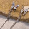 Pendientes de clip con borla de mariposa blanca brillante y diamantes, sin agujeros, diseño de nicho para mujer, personalizados, dulces, modernos y atractivos.