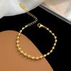 Al por mayor transfronterizo europeo y americano acero de titanio sin decoloración círculo 18K cuentas redondas de alta calidad moda todo partido pulsera dorada para mujer