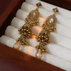 Pendientes de borla de cristal ovalado incrustados de diamantes pendientes étnicos de minorías vintage pendientes de moda de alta gama versátiles para mujer