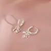 Nuevos Pendientes Cortos de Lazo y Borla Estilo Niche para Mujer, Pendientes Versátiles y de Lujo con Colgante de Circonita