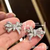 Pendientes Nuevos Cao Shi Estilo Coreano Suaves Shein para Mujer, Pendientes Exquisitos de Lazo Simétrico, Princesa de Red Social